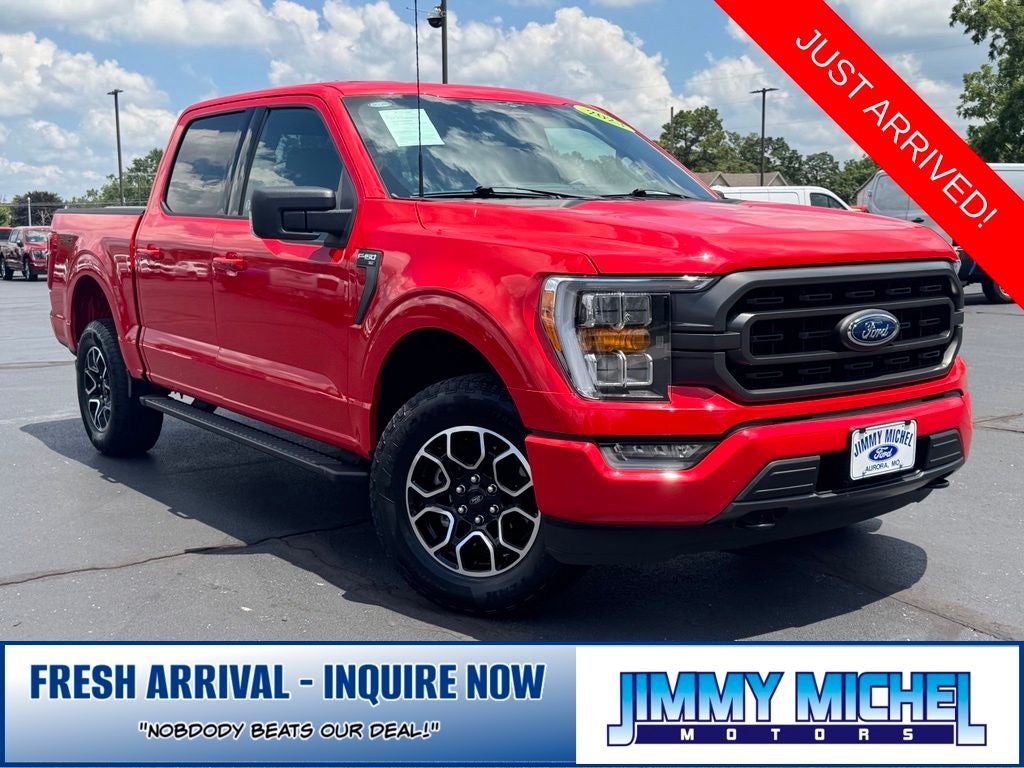 2023 Ford F-150 XLT in Race Red — front three-quarter view